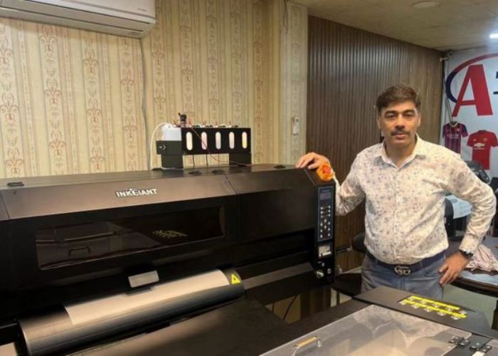Bigfoot customers with their DTF printer